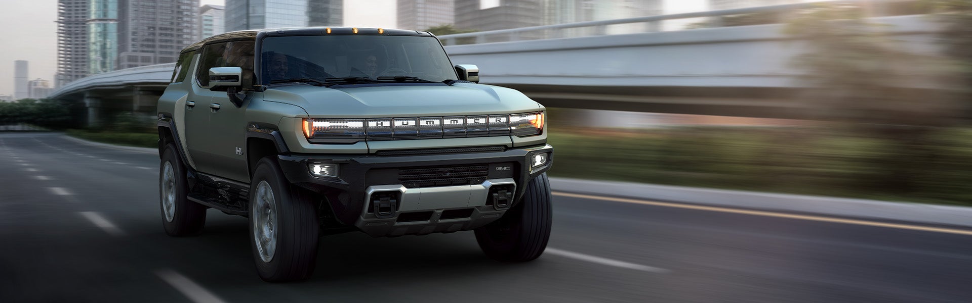 2024 GMC HUMMER EV Pickup running on road